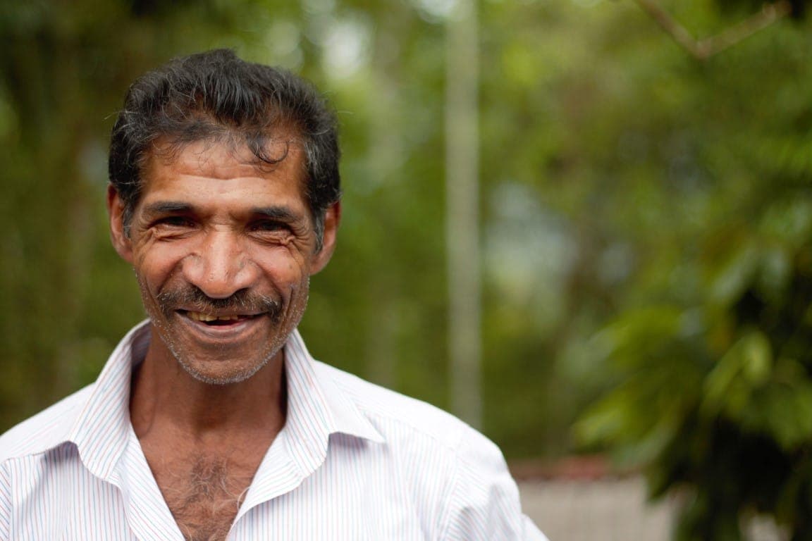 A smiling villager met on the village walk