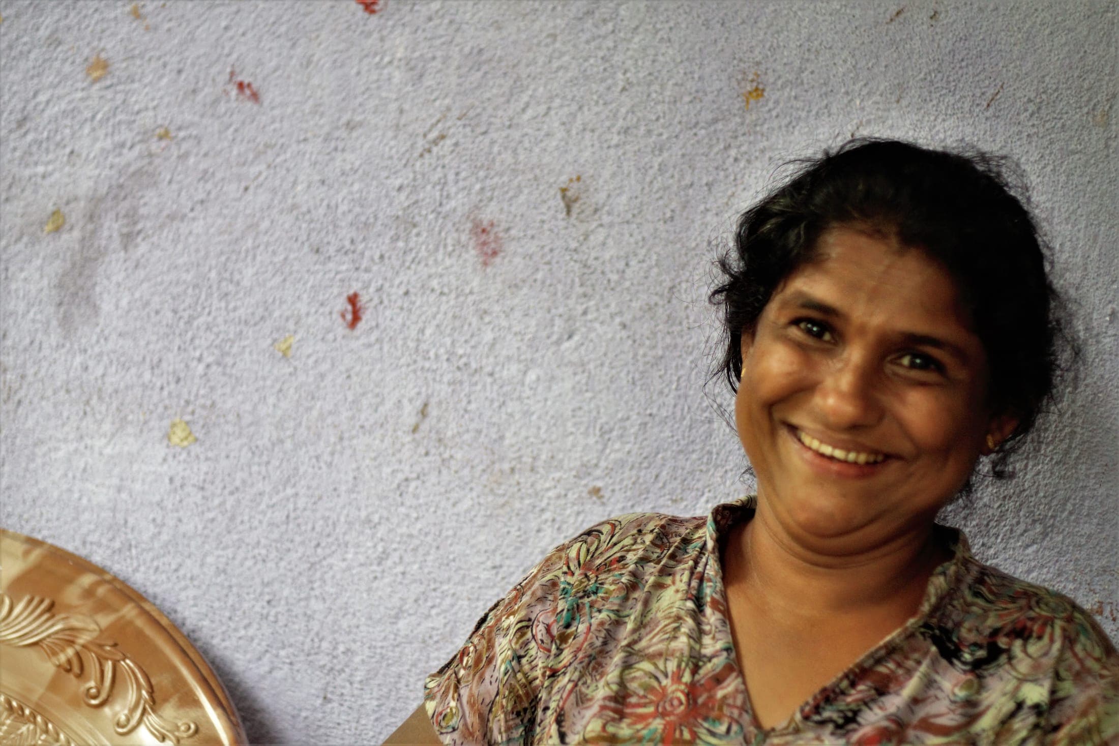A smiling woman from the village