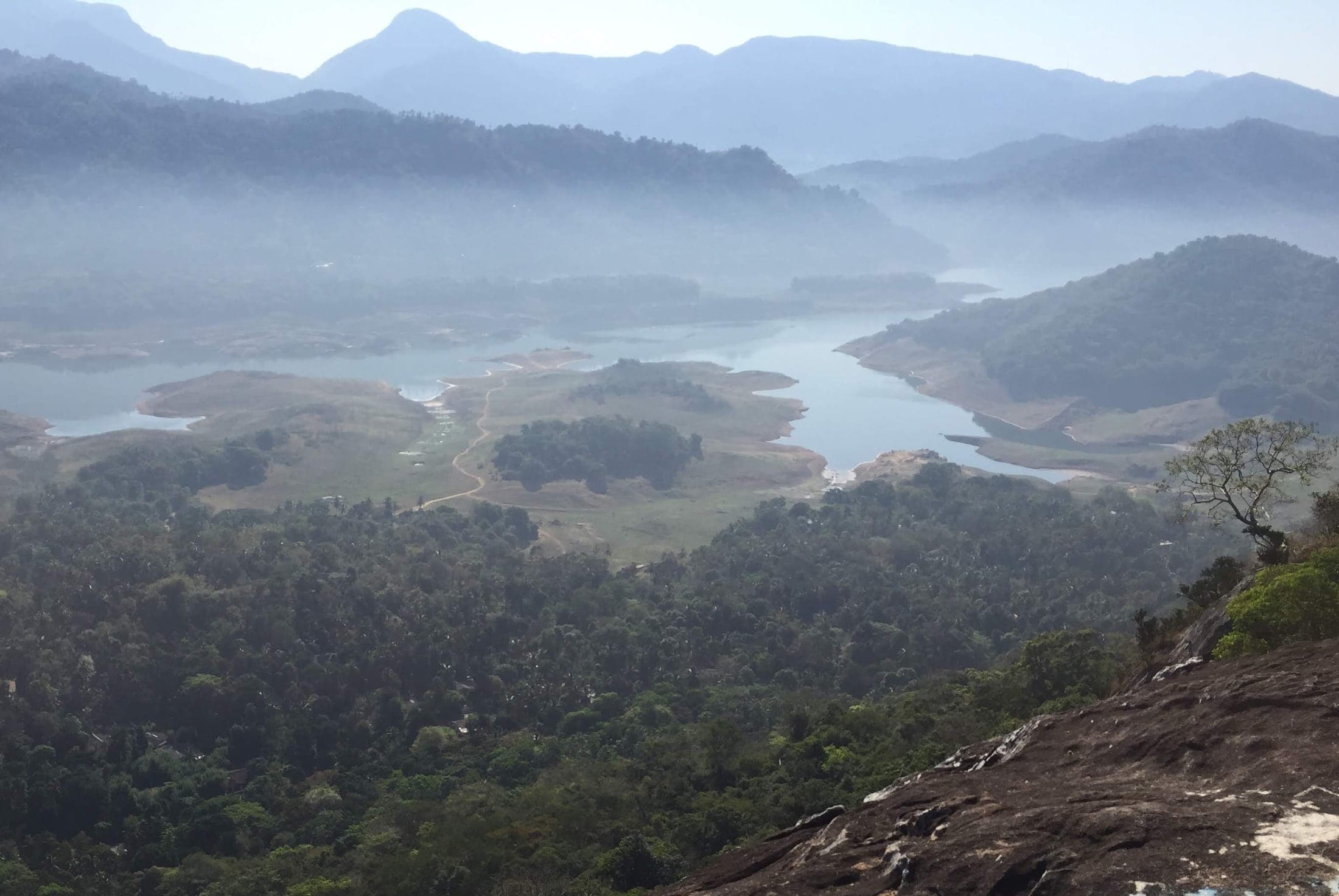 Mist over Victoria Lake and the surrounding hills near Wepathana